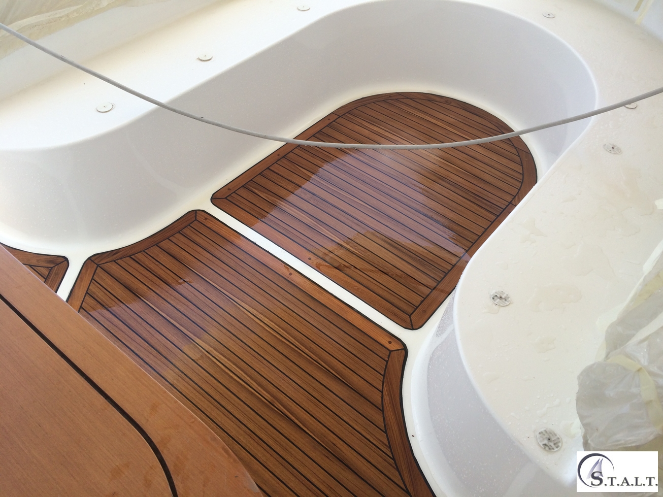 Restauro coperta in teak abbate primatist