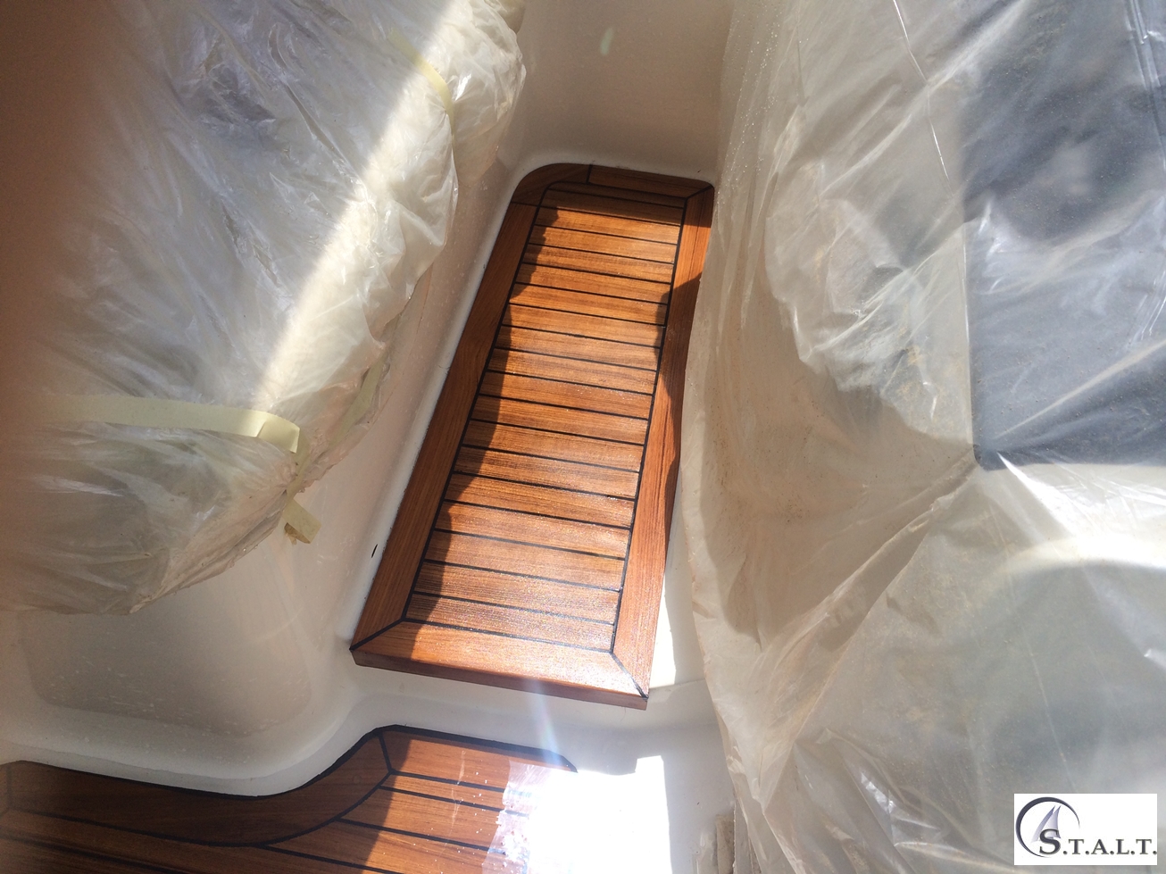 Restauro coperta in teak abbate primatist