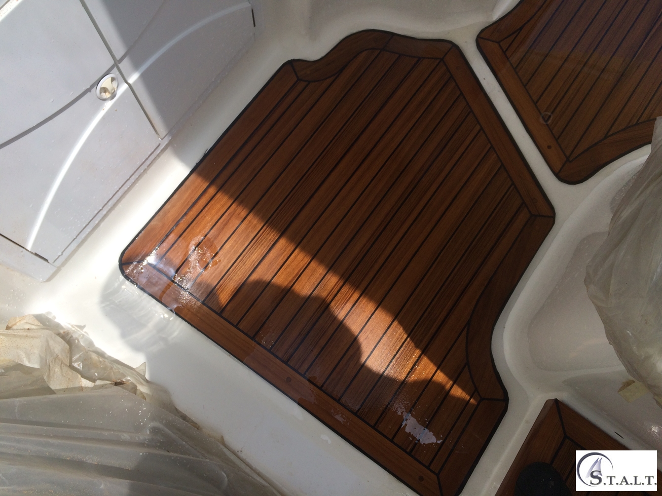 Restauro coperta in teak abbate primatist