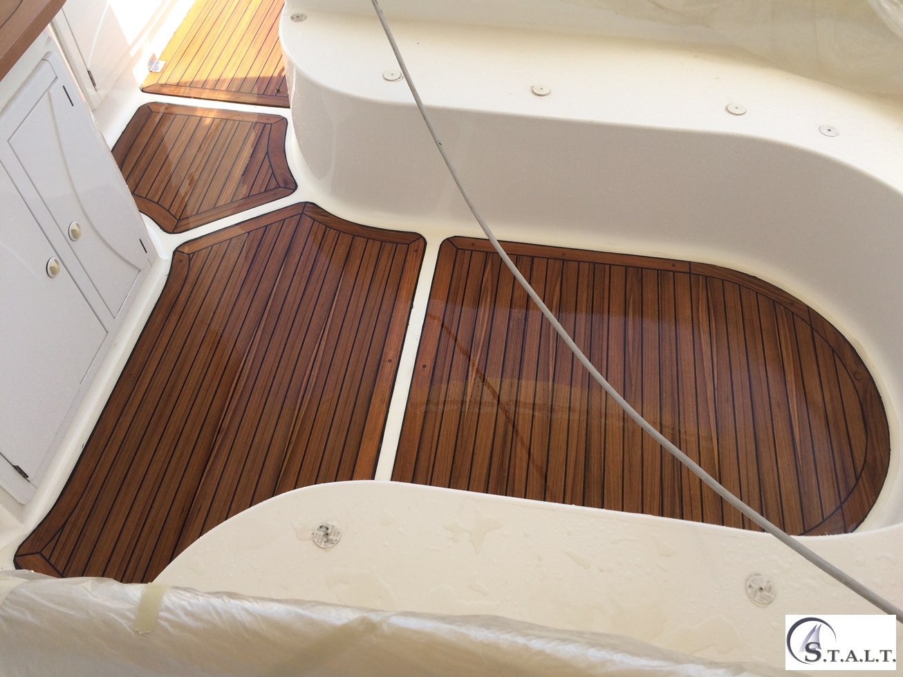 Restauro coperta in teak abbate primatist