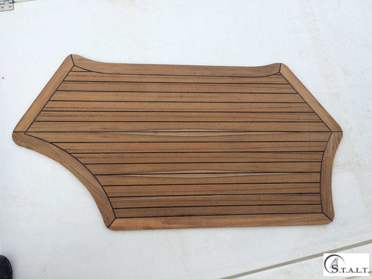 Restauro coperta in teak abbate primatist
