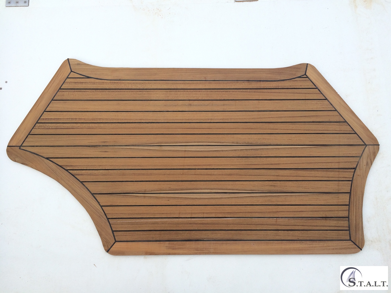 Restauro coperta in teak abbate primatist